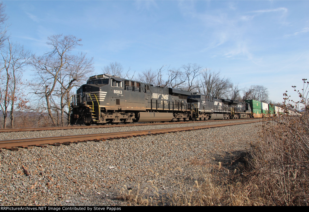 NS 8083 leads train 21E at MP116